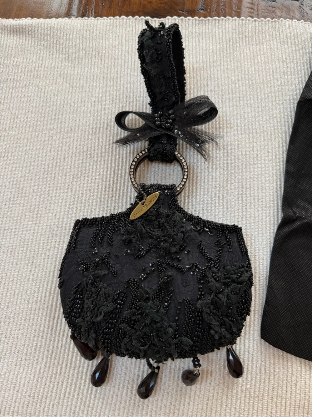 Mary Frances Black Beaded Wristlet Clutch with Rhinestone Ring & Bow Accent